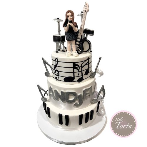 Muzicka torta sa pevacicom i instrumentima